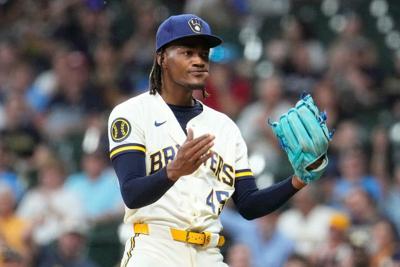 May 26, 2026; Milwaukee, Wisconsin, USA; Milwaukee Brewers pitcher Abner Uribe (45) celebrates the final out of in the eighth inning against the St. Louis Cardinals at American Family Field. Mandatory Credit: Michael McLoone-Imagn Images